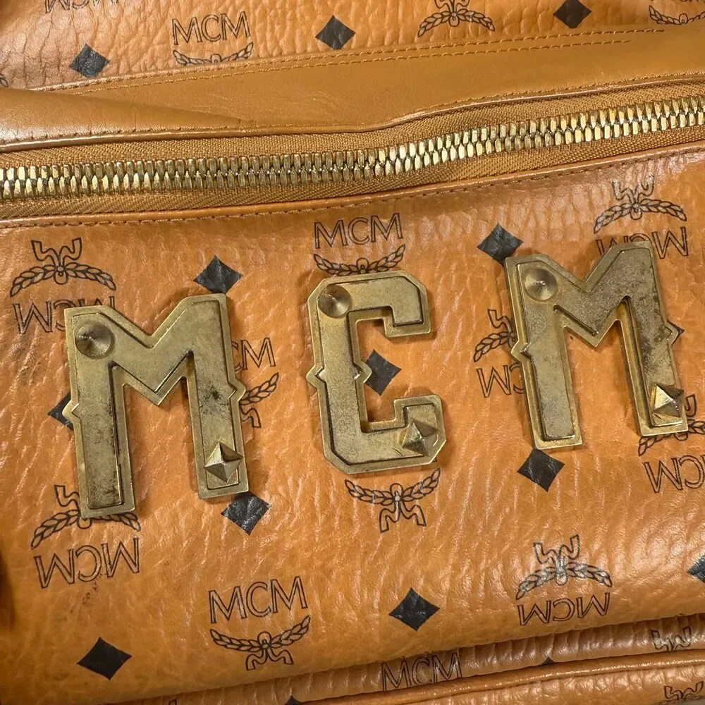 MCM Visetos Studded Medium Stark M Logo Collection Backpack Cognac Monogram